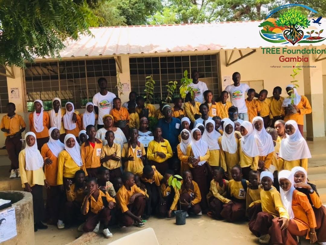 Pupils and teachers of Medina Kanuma Lower Basic School gathered for a tree planting day